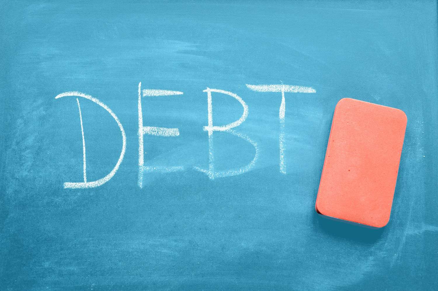 budget-spreadsheet-pay-off-debt - DEBT on a blackboard