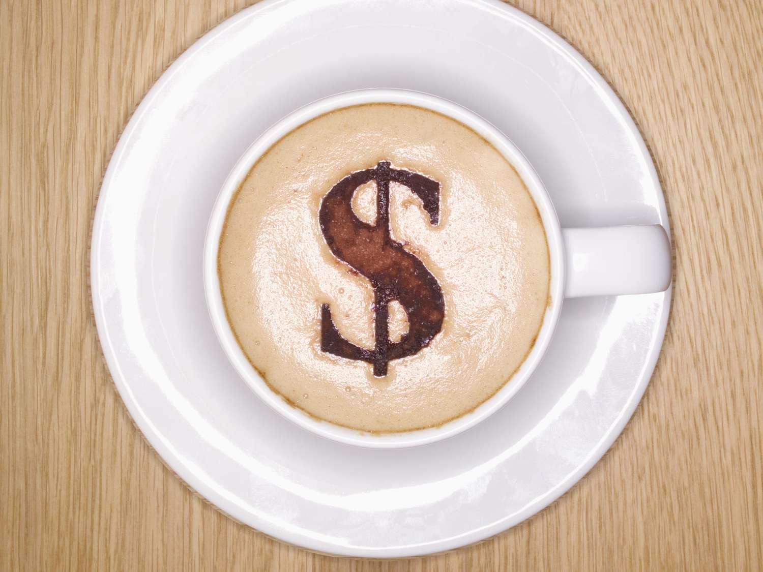 Cup of Cappachino with a Dollar Symbol made from Choclate on top