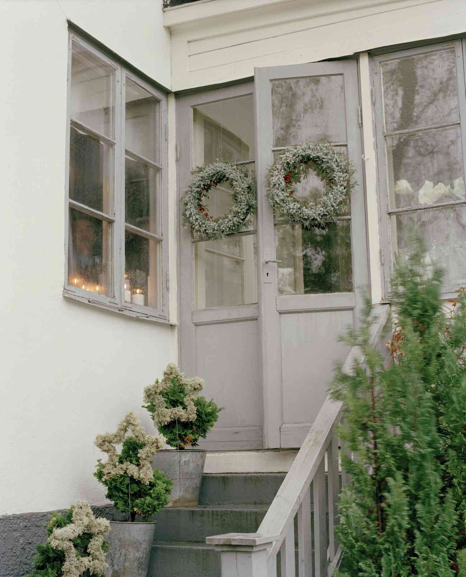 Front Door Decor Ideas, Potted Evergreen on stairs