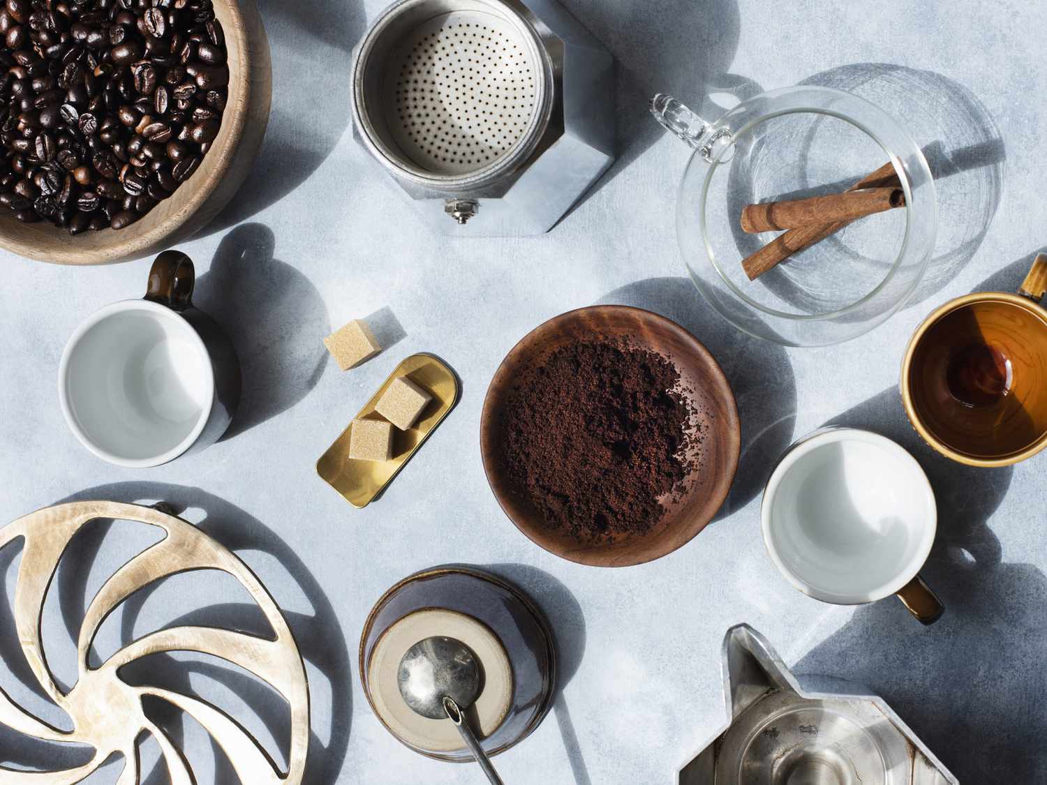 Overhead view of still life with coffee beans and accessories
