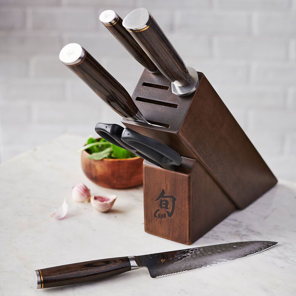 The Shun knife set in a wooden knife block on a counter