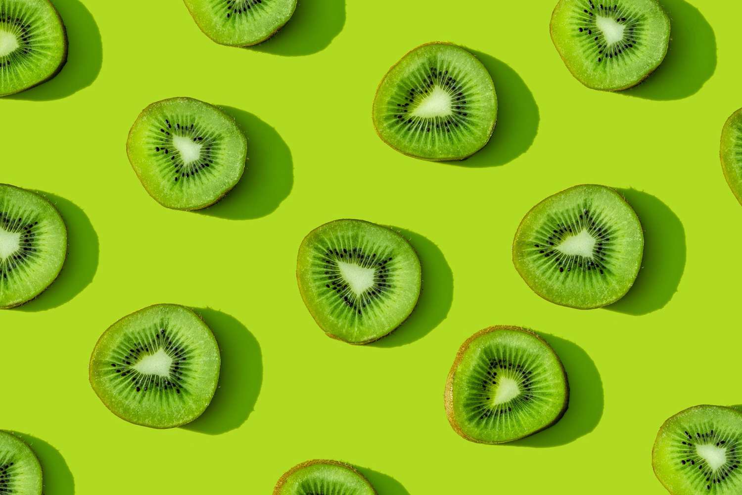 Kiwi fruit pattern on green