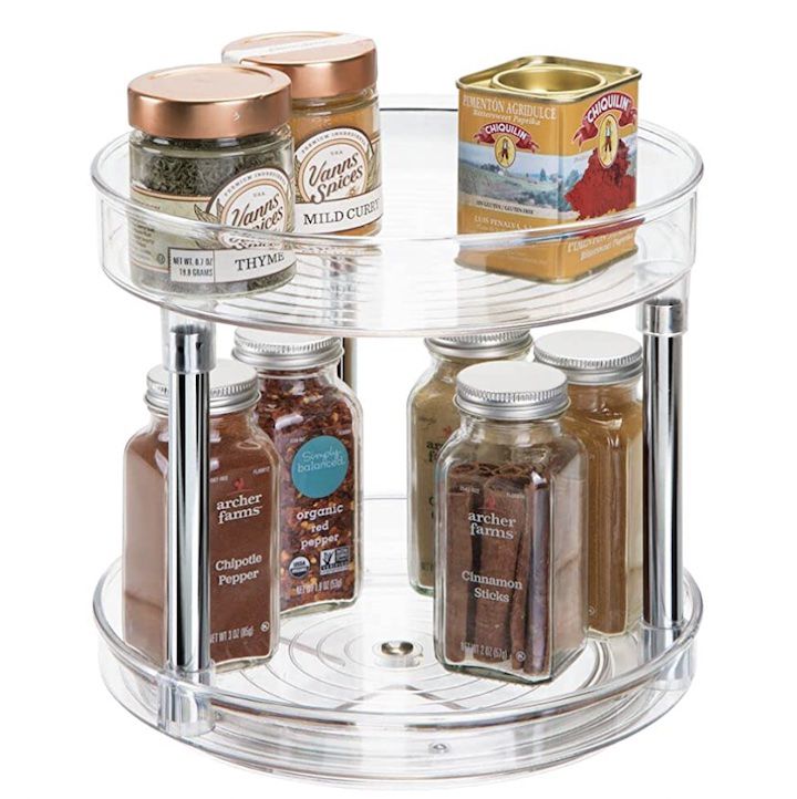 2-tier clear spice rack with spices on it