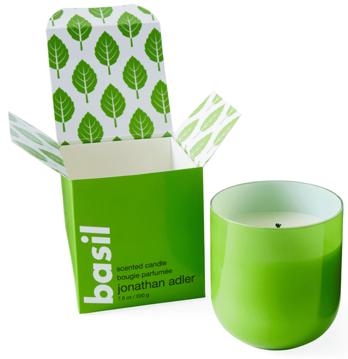 Bright green basil-scented candle with a green box