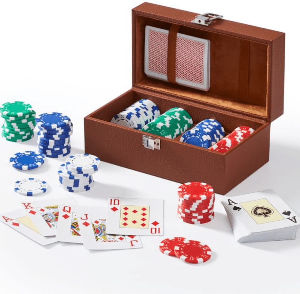 Camel leather box with multicolored poker chips and decks of cards