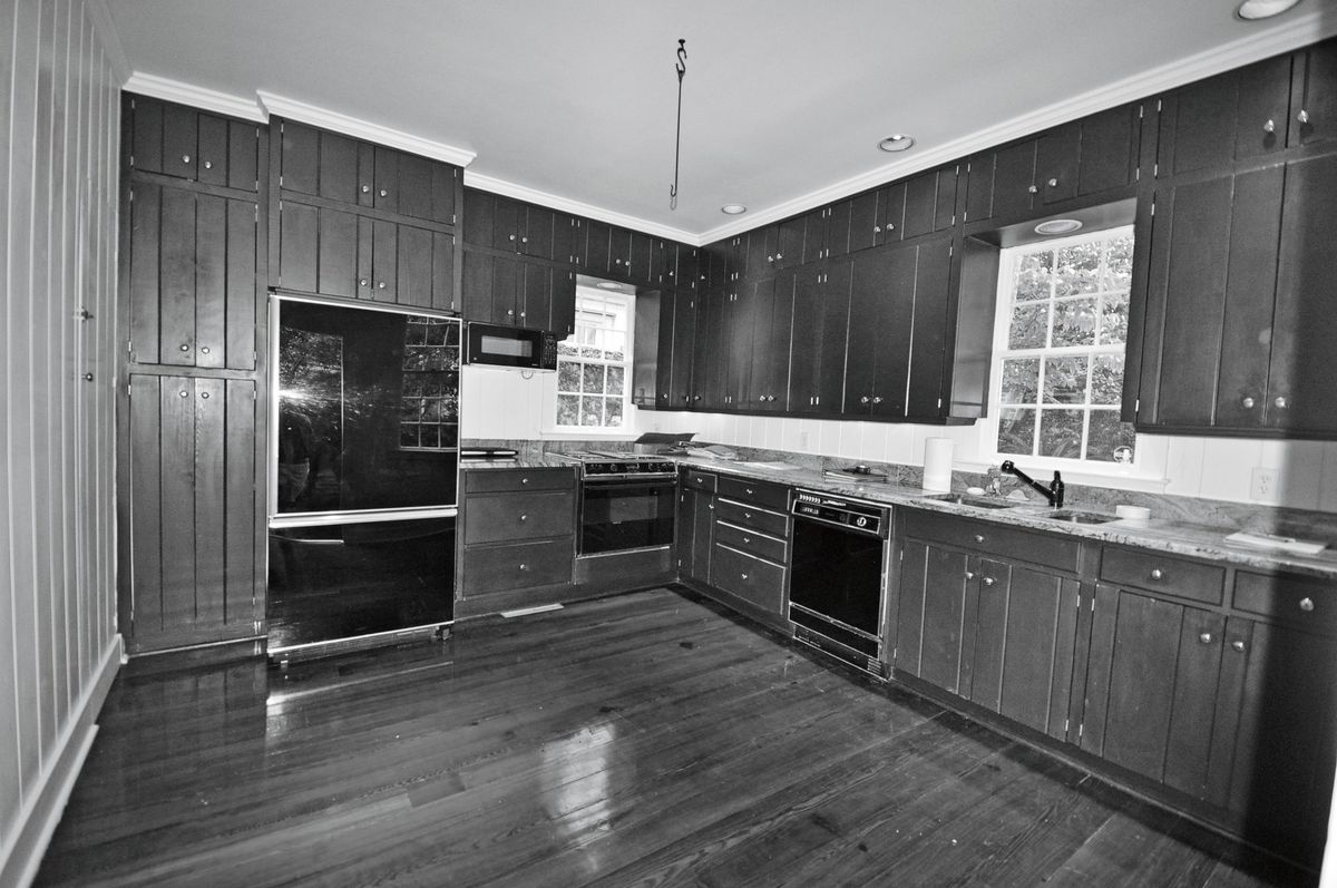Dated Farmhouse Kitchen with Wood Cabinets