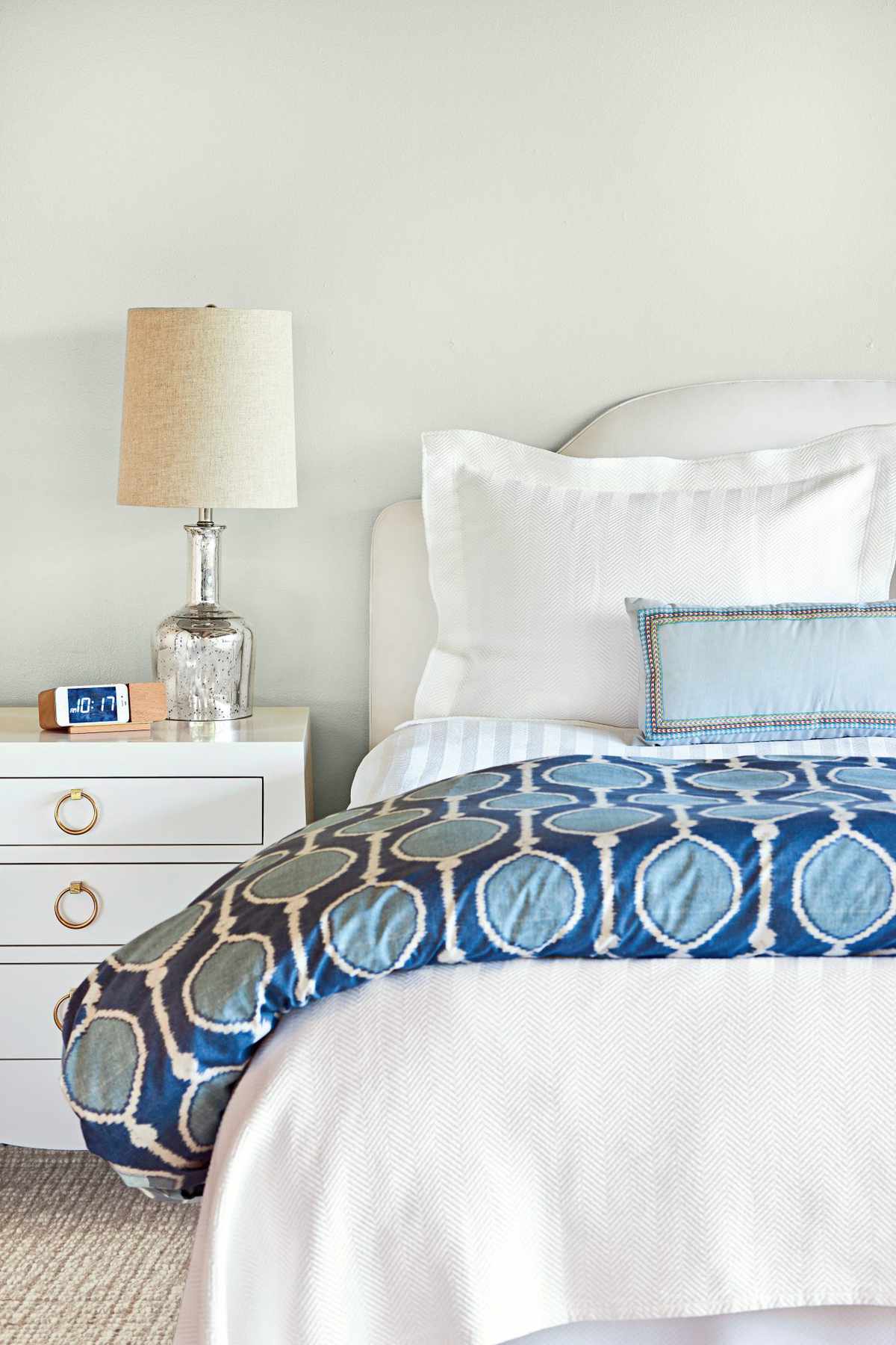 White Bedroom with Blue Comforter