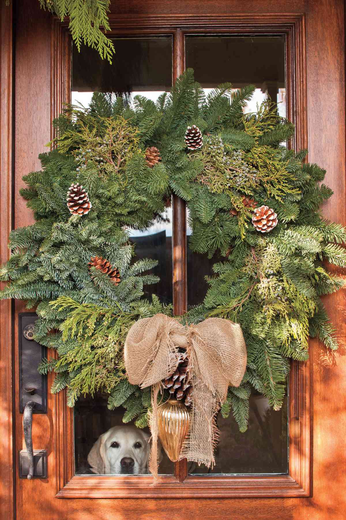 Wood Front Door with Cedar Wreath