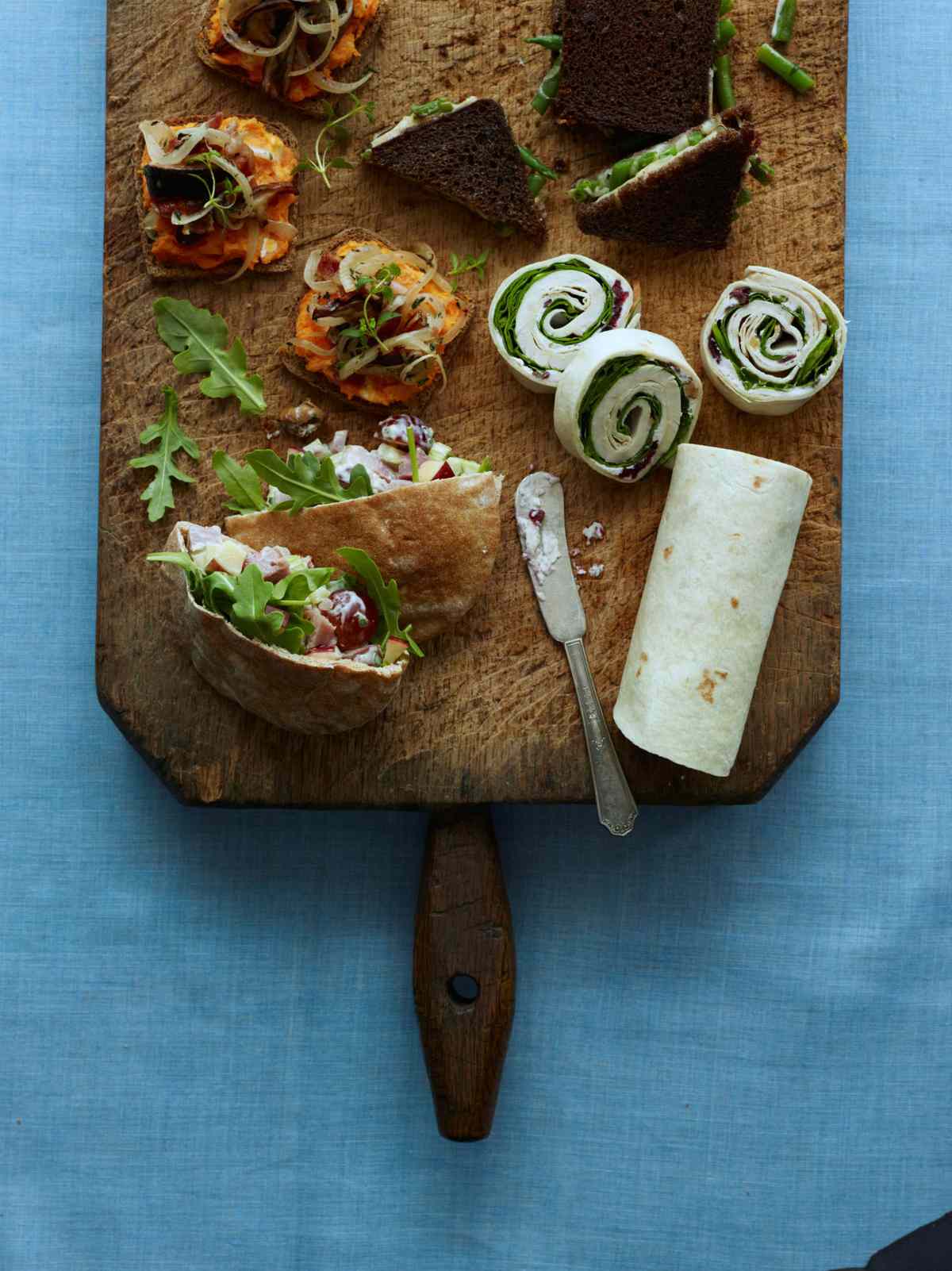 Turkey-and-Spinach Wraps with Cranberry-Walnut-Cream Cheese Spread