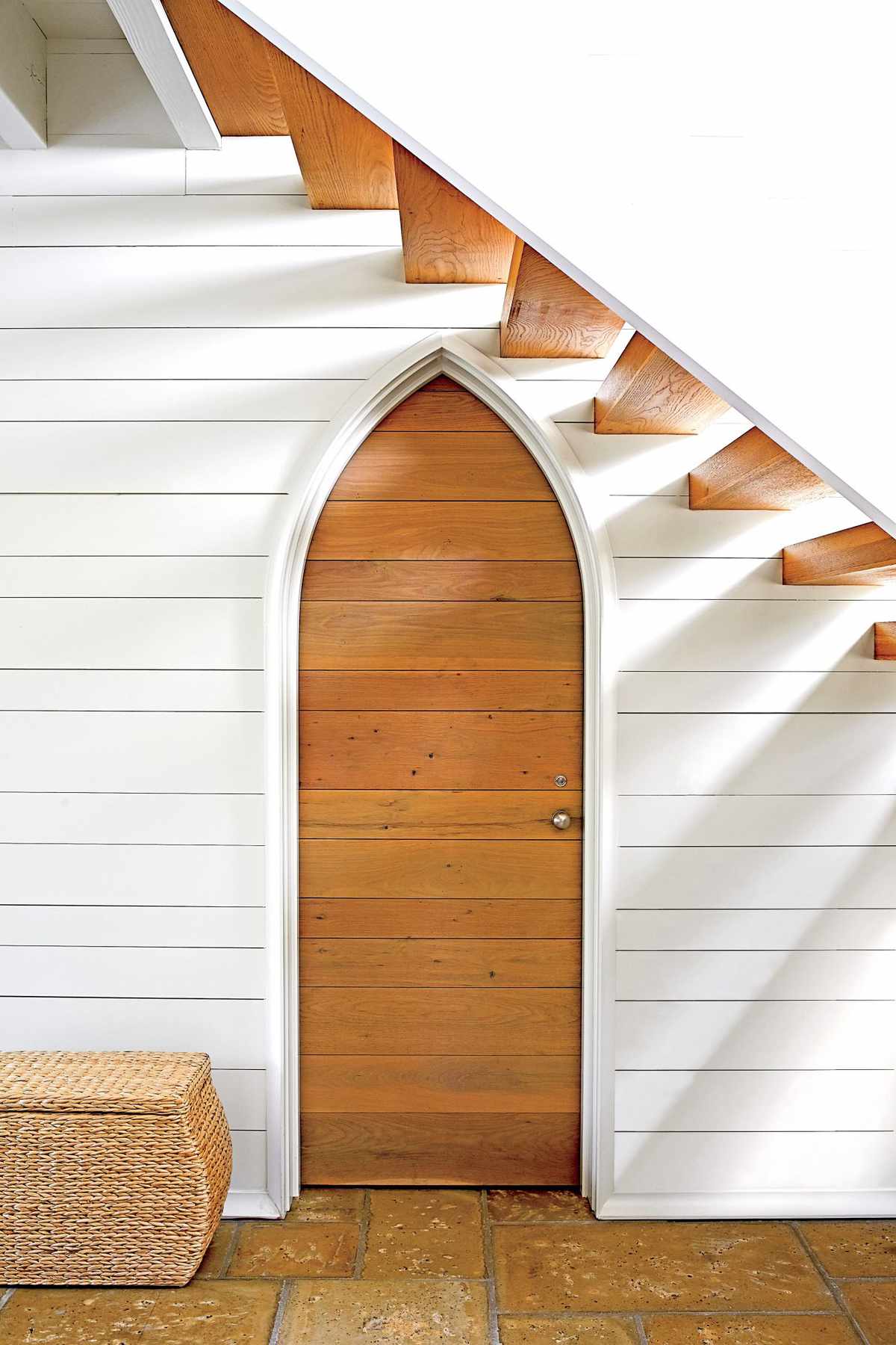 Gothic Door Surrounded by White Shiplap