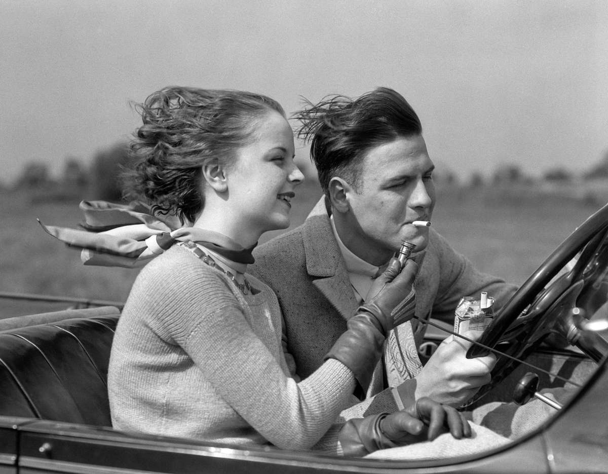 Couple driving in car
