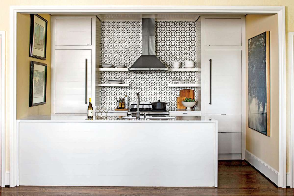 Glossy White Kitchen with Tile Backsplash
