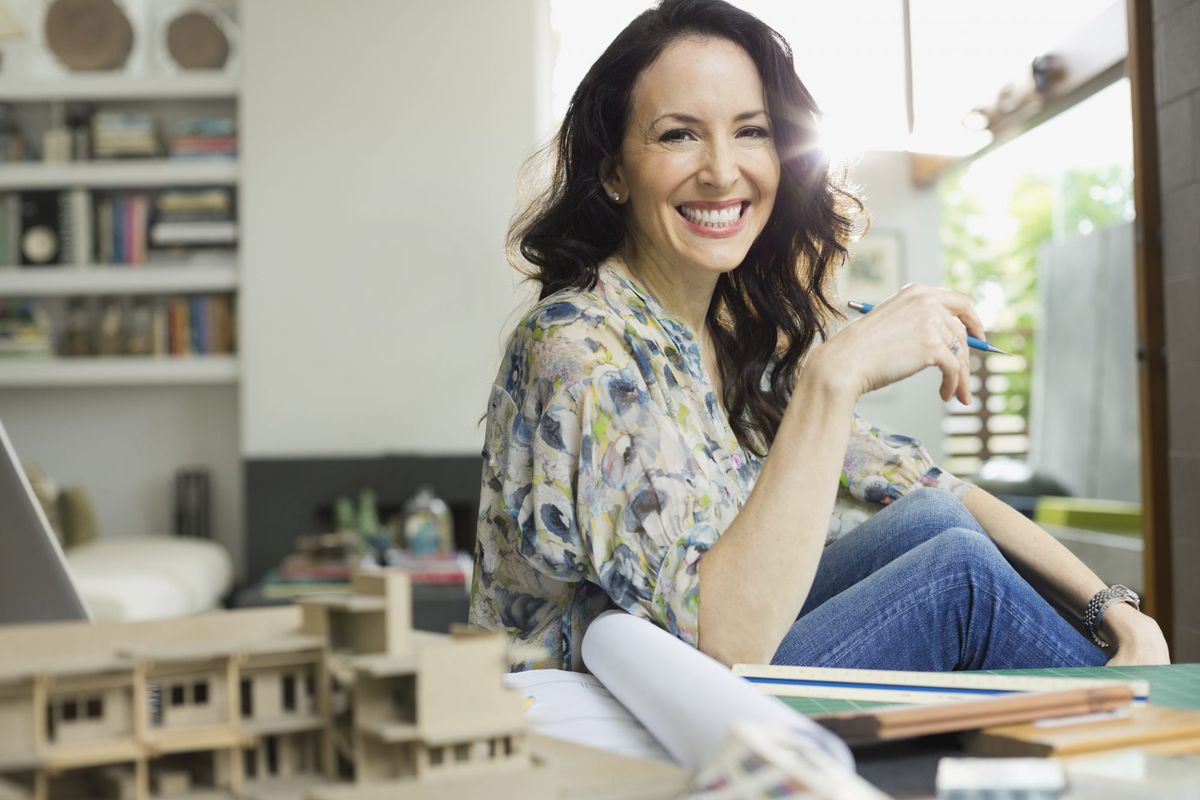 Woman Smiling in Home Office