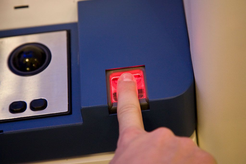 A finger print scan is taken, required to qualify for the Clear card from Verified Identity Pass, Inc. The card is part of TSA's (Transportation Security Administration) Registered Traveler program which allows travelers, for a fee, to have their backgrou