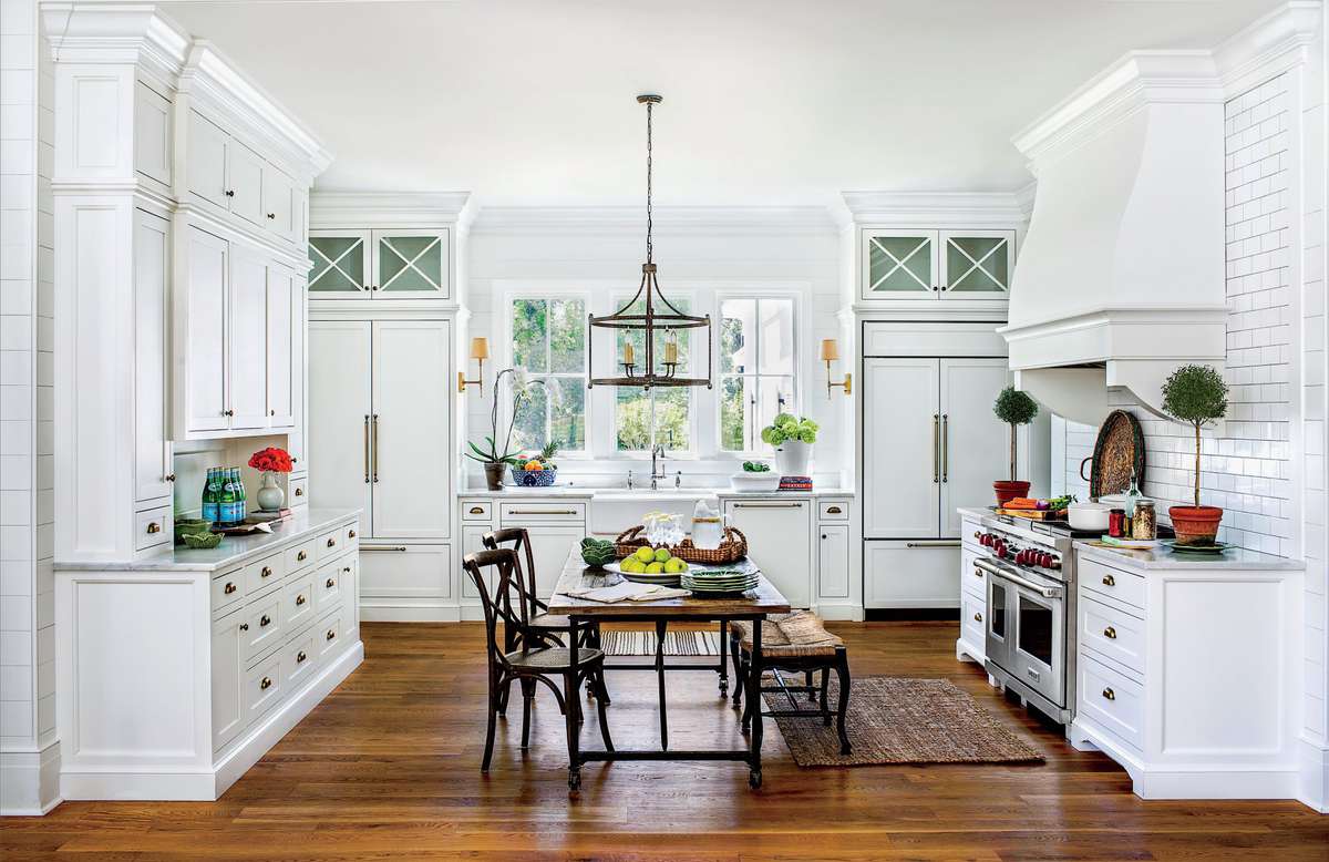 Large White Kitchen with Farm Table Island