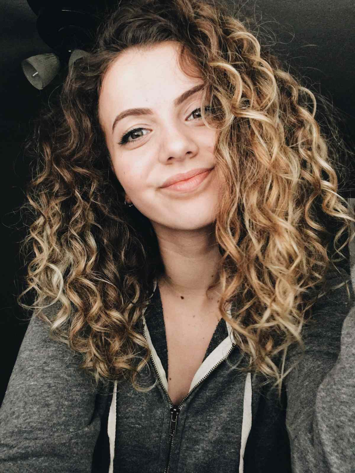 Curly Brown Hair with Blonde Highlights