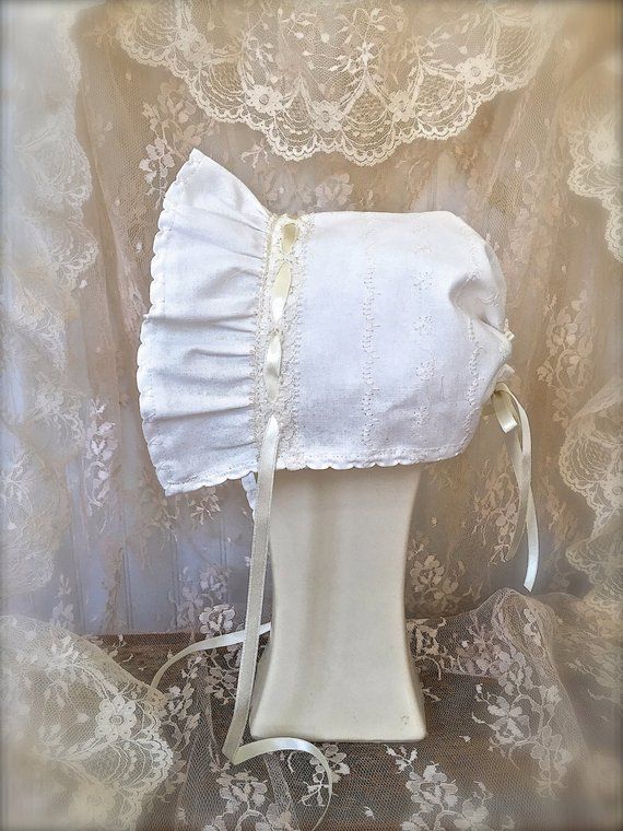 Bonnet with Decorative Stitching, Satin Ribbon, and Lace