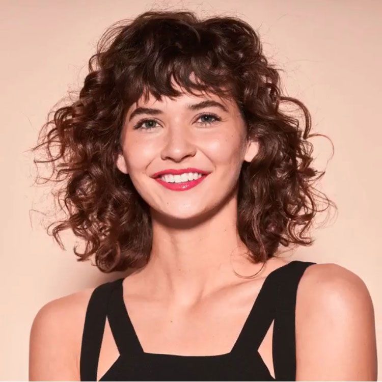 Short Curly Hairstyles That Will Give Your Spirals New Life Southern Living