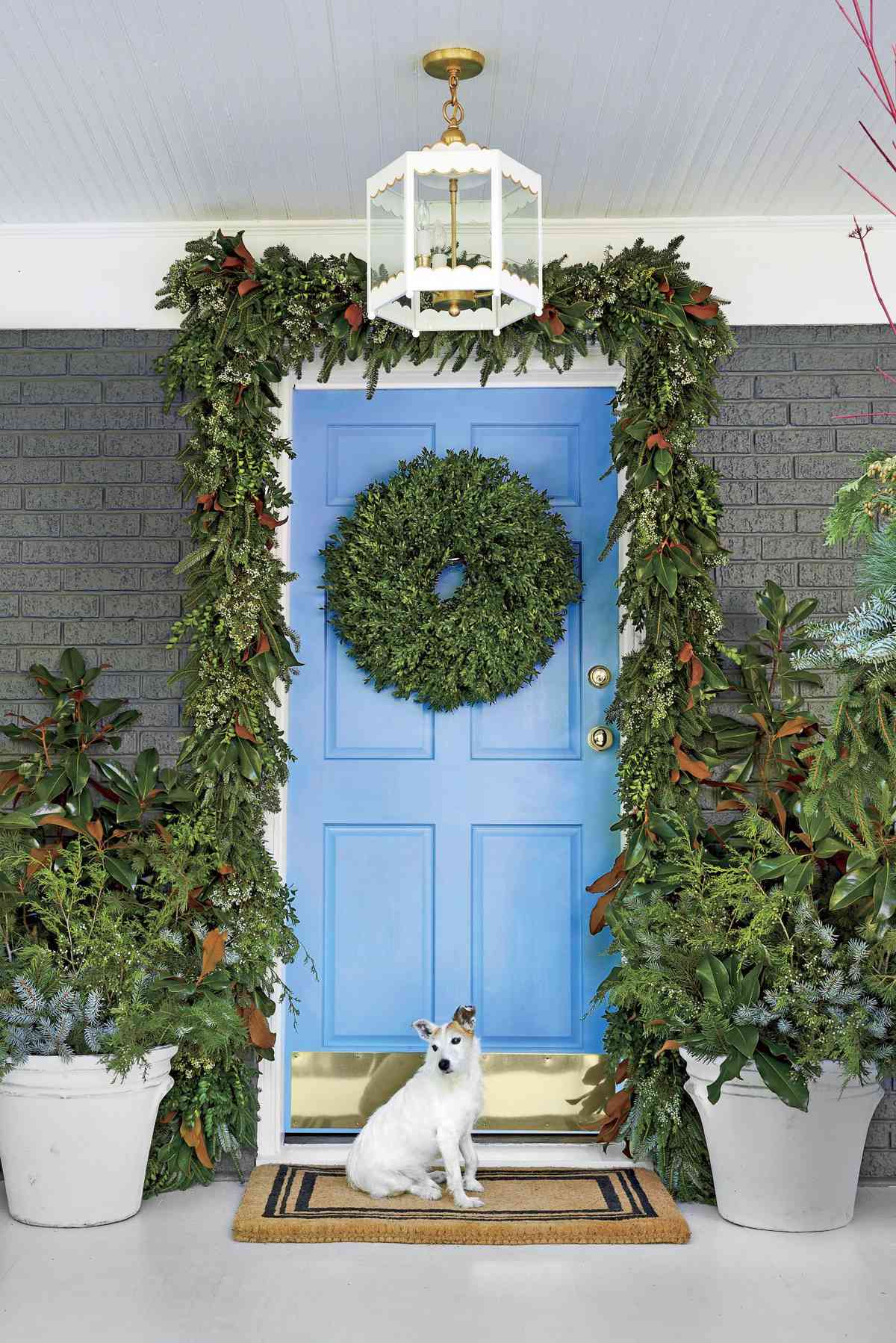 Blue Front Door with Christmas Greenery