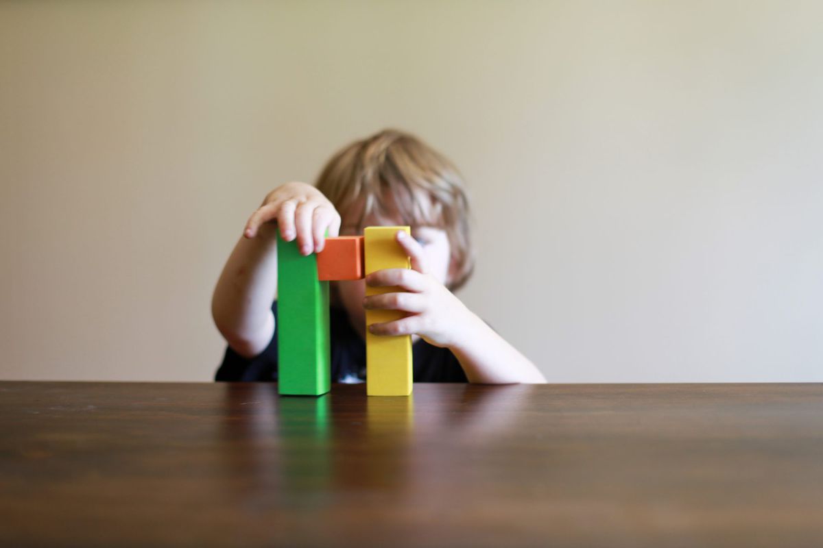 Boy Playing with Blocks