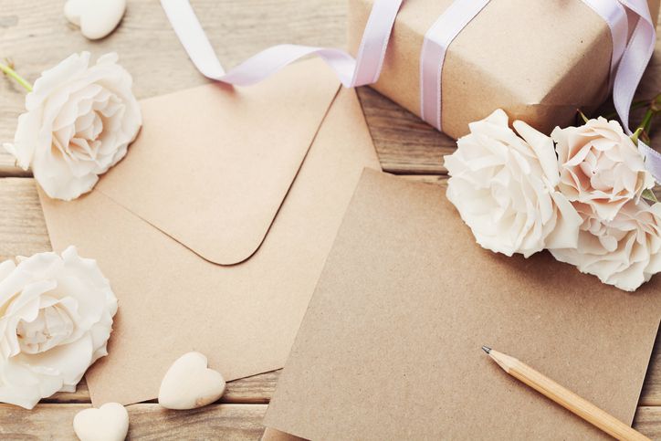 Envelope or letter, gift, paper card and roses. Greeting concept.