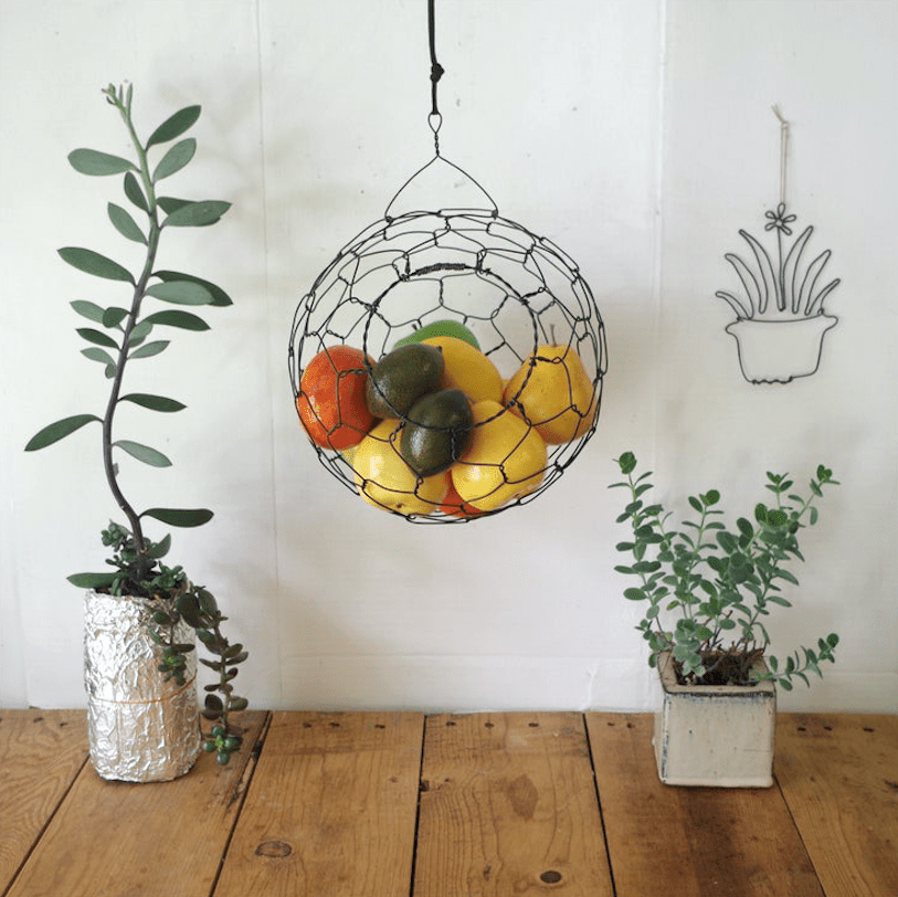 <p>4th Anniversary: Fruit &amp; Flowers</p>
                            <p>Gift Idea: Fruit Basket</p>
                            <p>BUY IT: $72; etsy.com</p>
                            <p>Year four is all about fruit. Instead of getting your spouse an edible arrangement; we suggest something super chic like this hanging fruit basket.</p>
                            