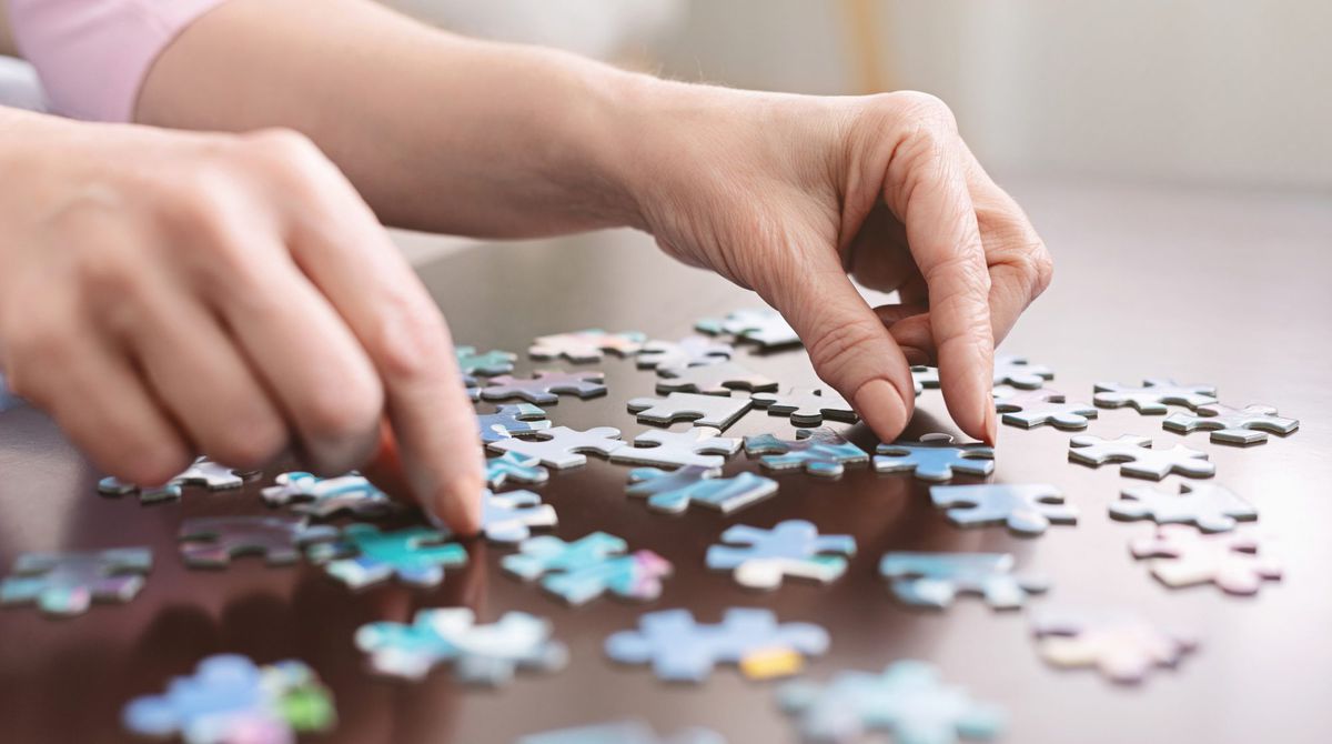 Woman Doing Puzzle