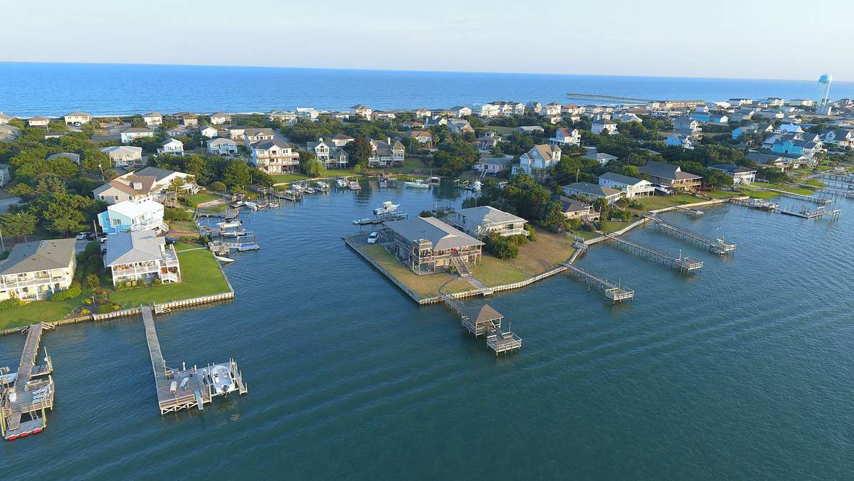 <p>With no high rises and an emphasis on conservation, this small town at the southern end of the 26-mile-long barrier island that shares its name is a top pick for real estate investment and a magnet for families seeking old-fashioned escape and beach life. Everyone's welcome here to enjoy the pale-sand beaches on both the Atlantic and Intracoastal Waterway sides, including dogs, who can hit the beach with their masters year-round (but on a leash from May 15-September 30).</p>
                            
