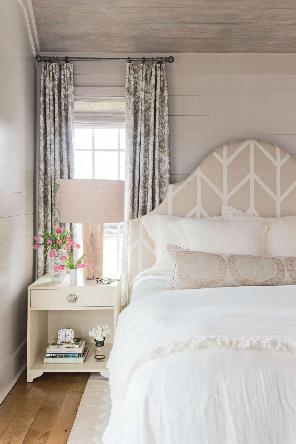 In this Sullivan’s Island, South Carolina, master bedroom, it’s all about a muted and romantic color palette.