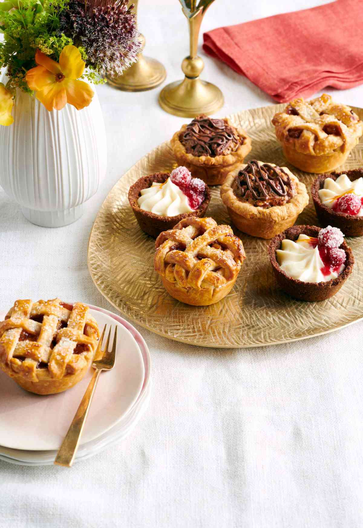 Mini Cinnamon-Apple Pies, Mini Cranberry-Cheesecake Pies, and Mini Chocolate-Pecan Pies