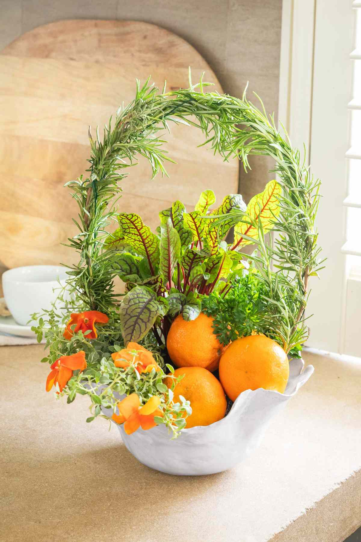 Herb and Orange filled Arrangement styled like a basket