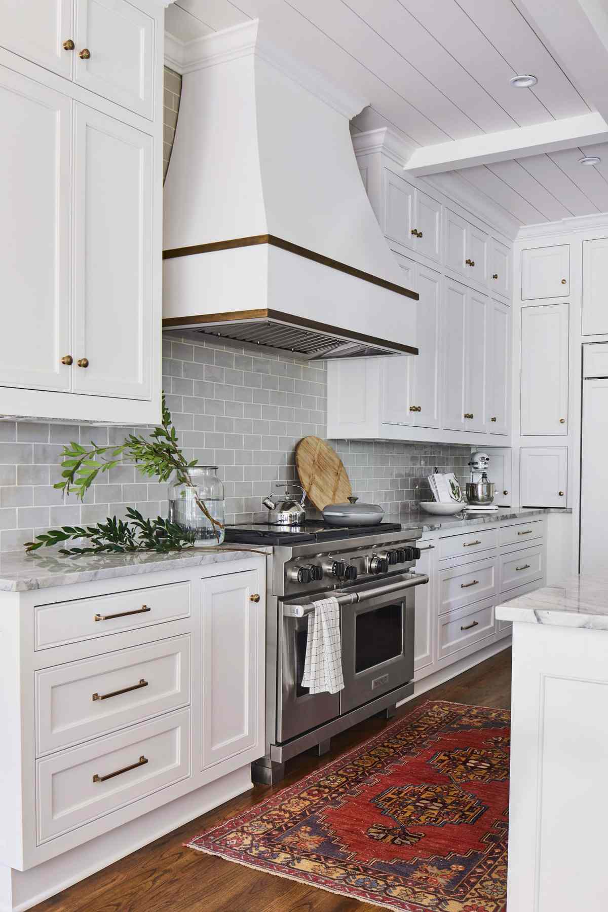 White kitchen with gray tile backsplash