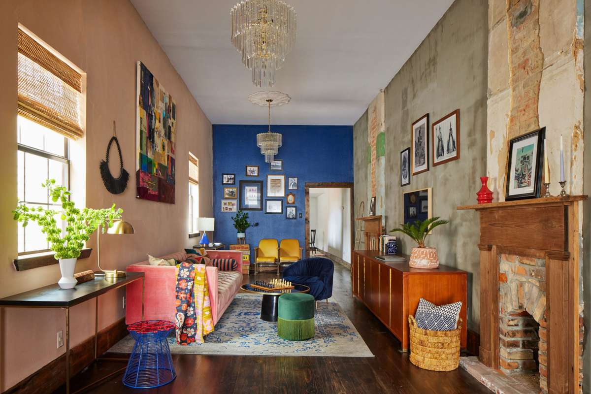 KEX Design + Build's KV Harper New Orleans Shotgun House Living Room with Pink Sofa