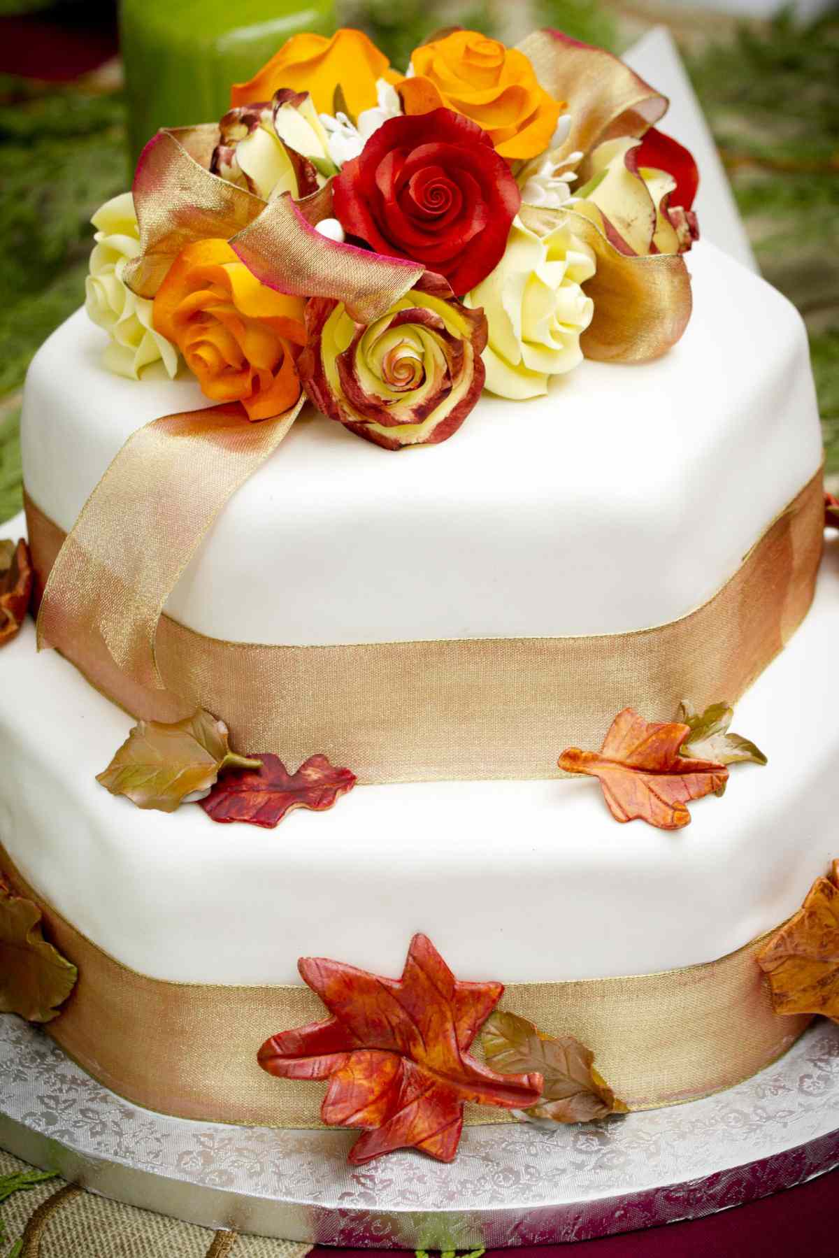 wedding cake with gold ribbon