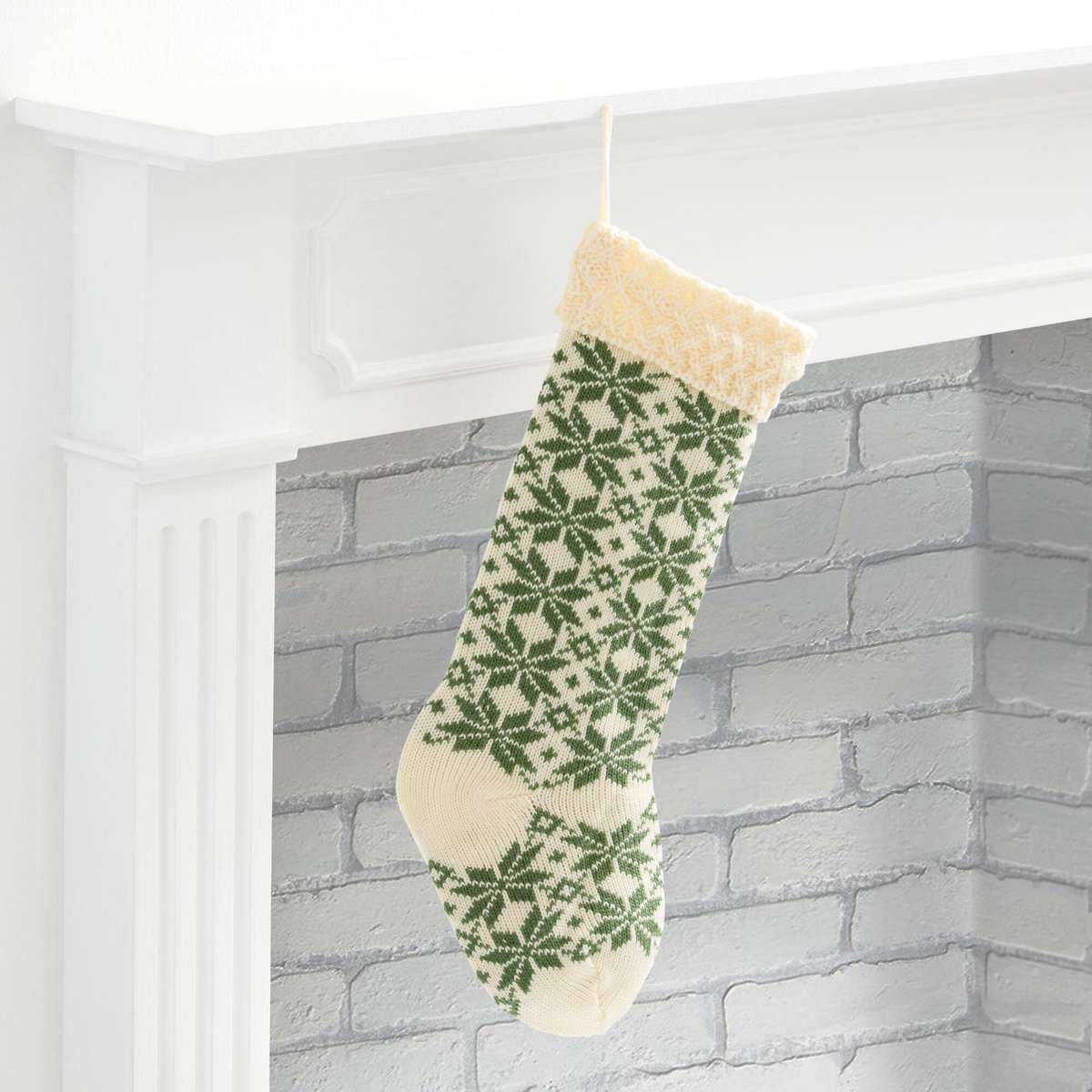 green and ivory fair isle knit christmas stocking