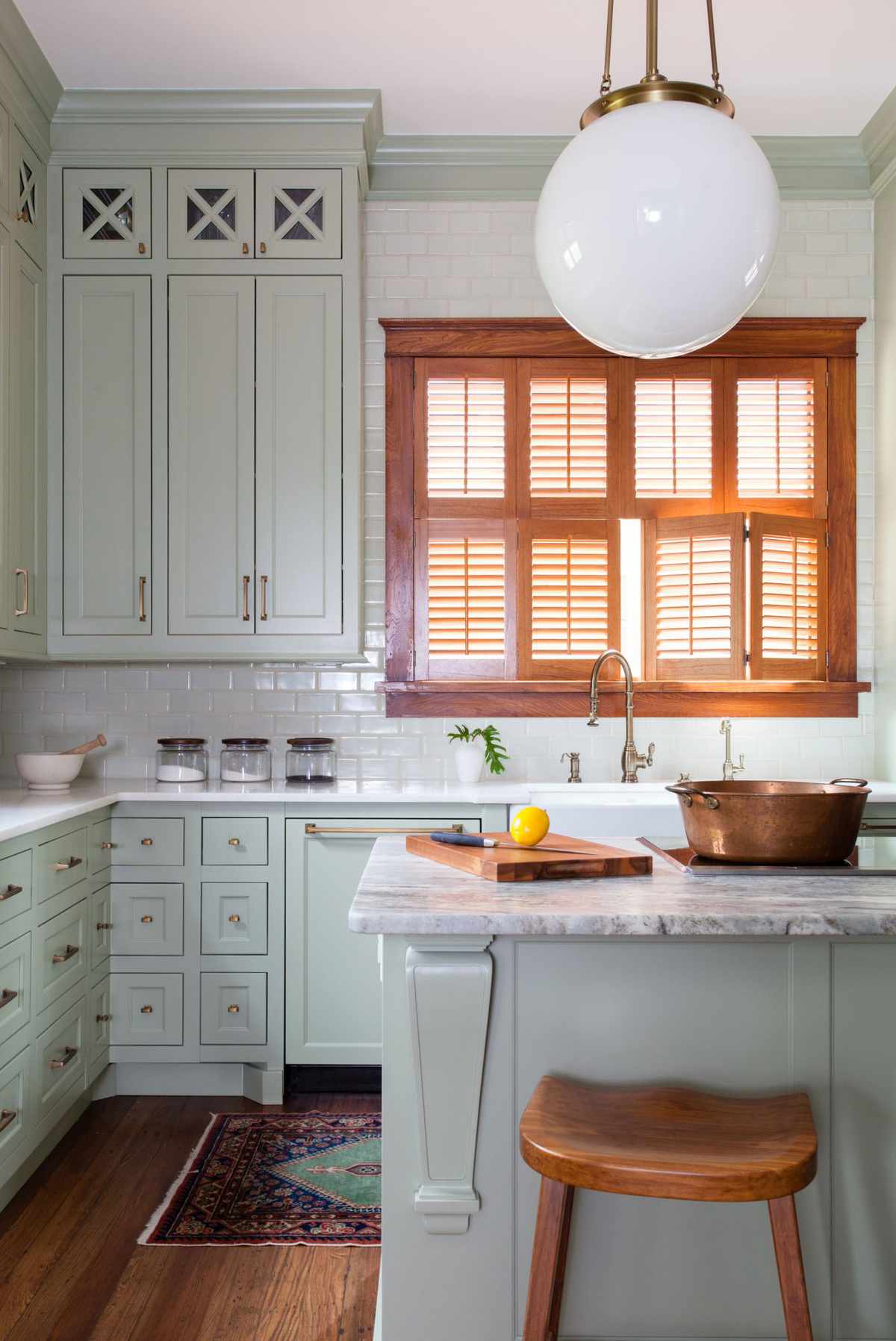Light Green Kitchen with Natural Wood Shutters