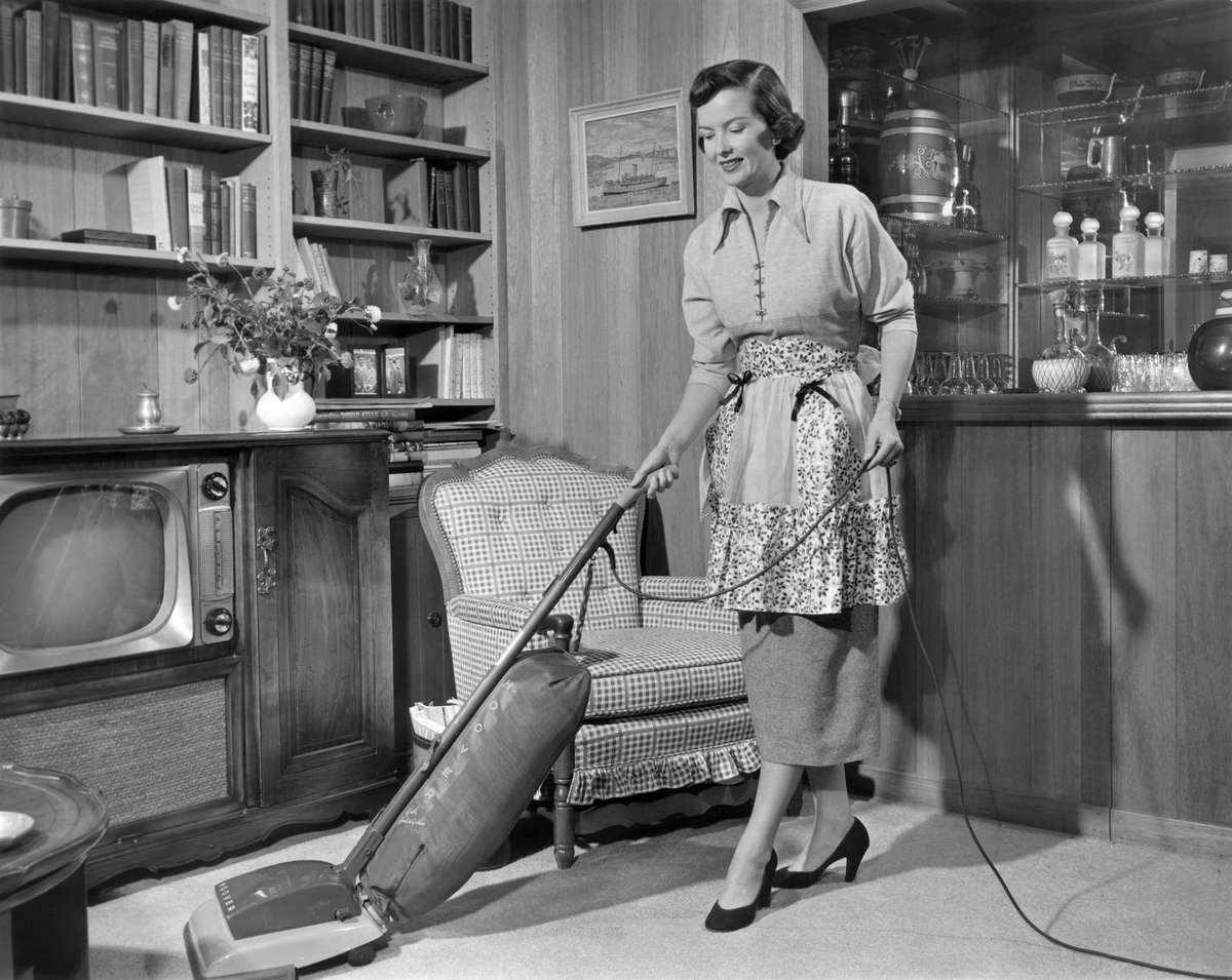 1950s Woman Vacuuming