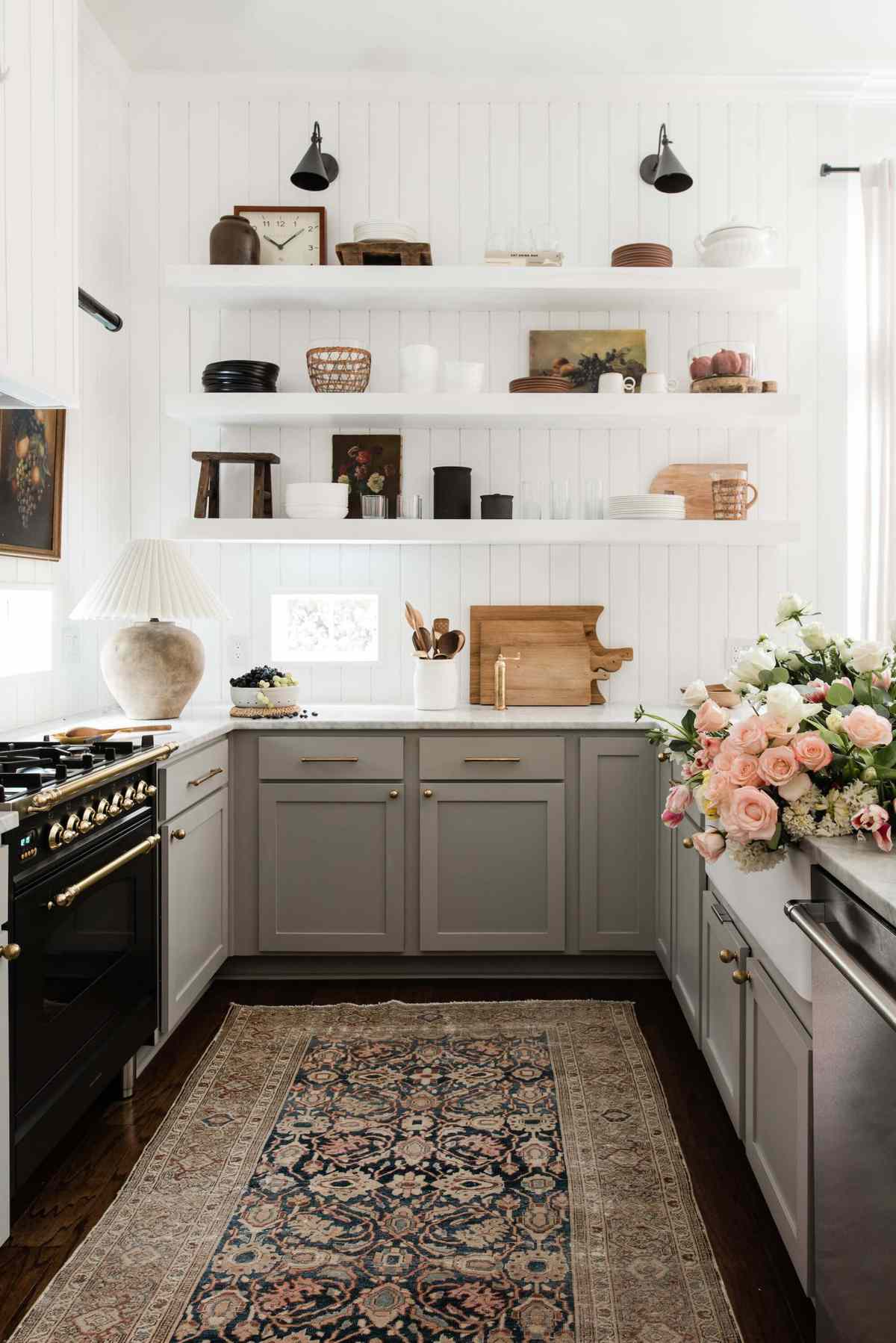 Clare Paint, Greige grey kitchen cabinets white tile backsplash open shelves