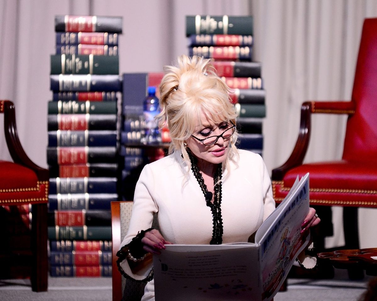 Dolly Parton reading a book
