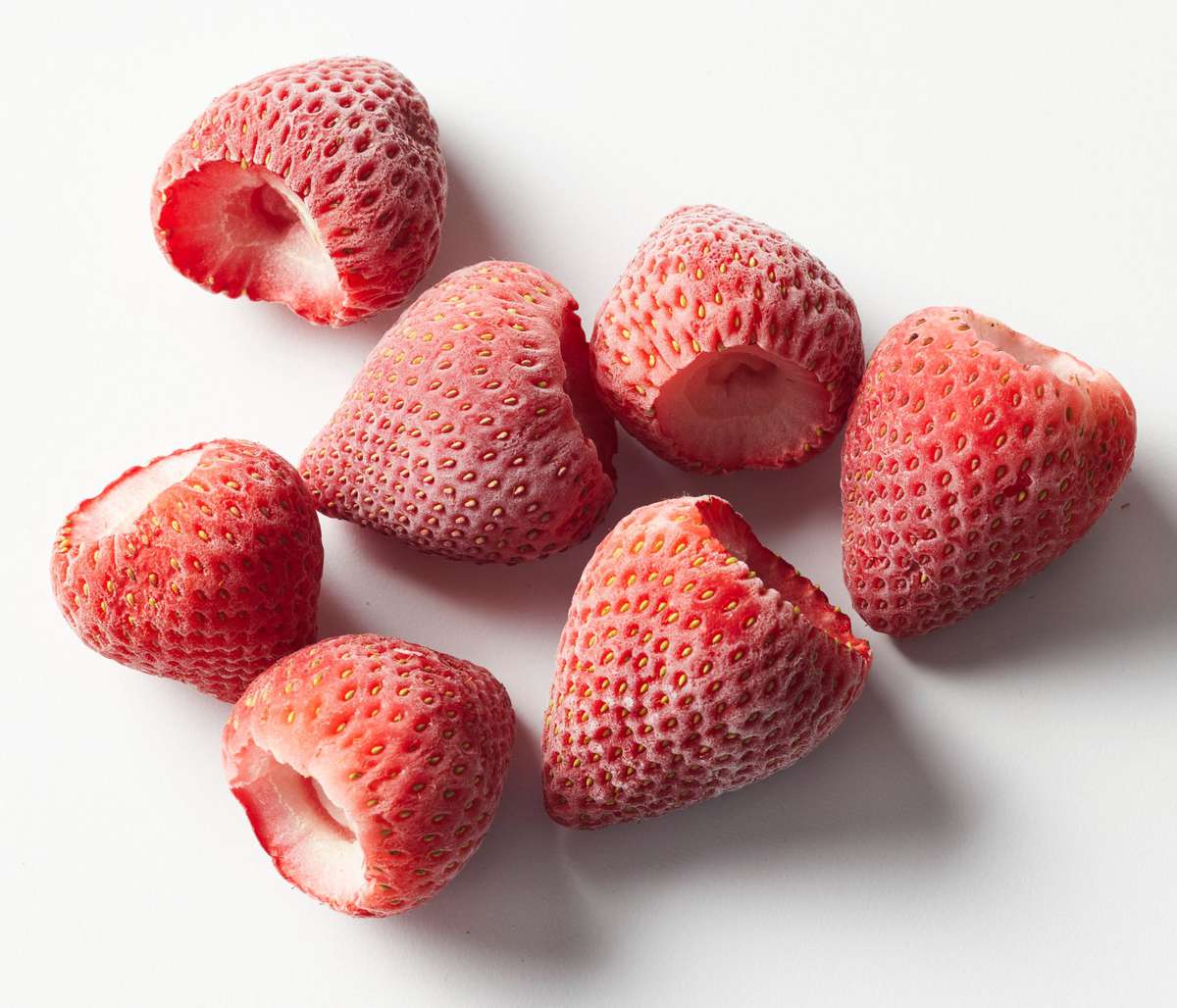 frozen strawberries on a white background