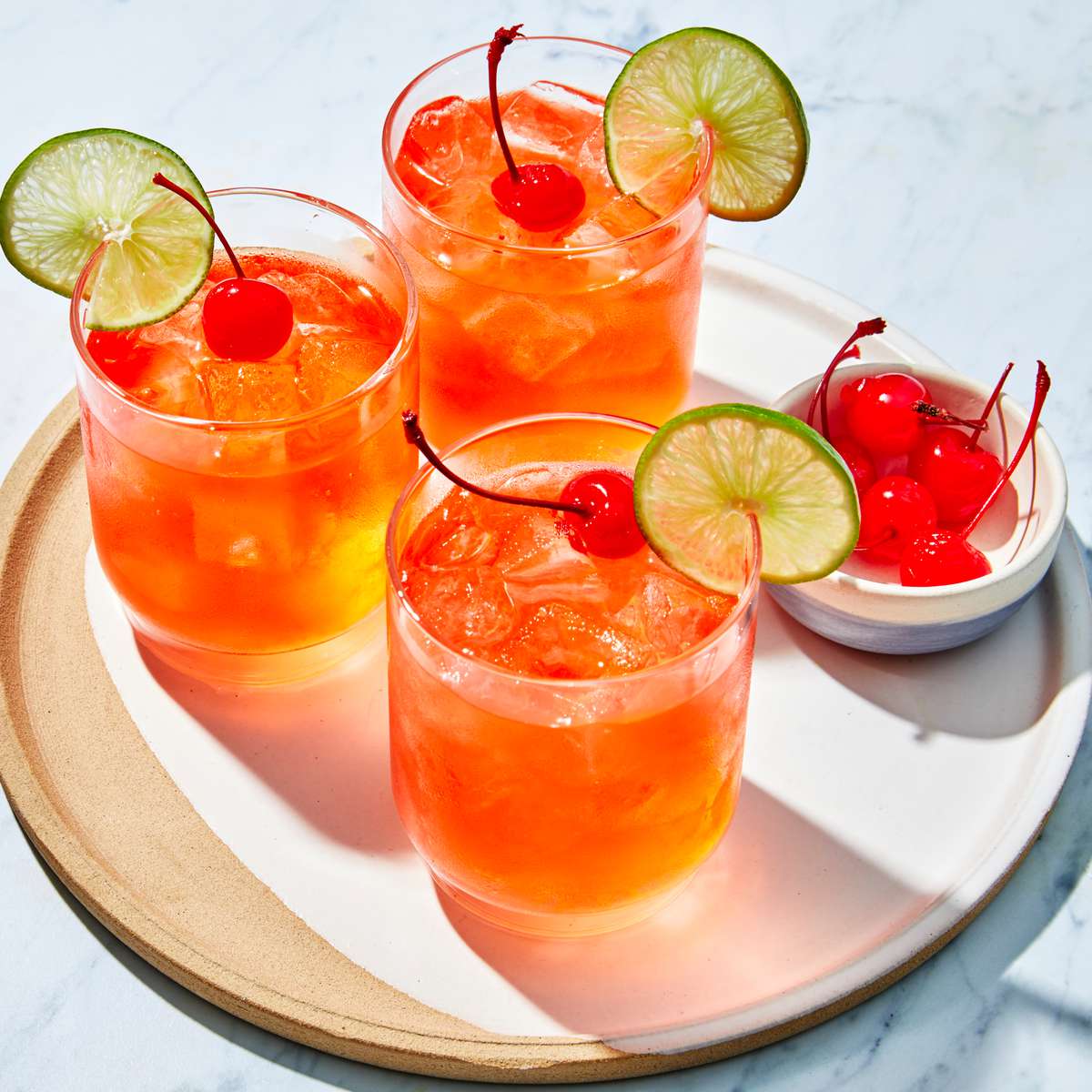 vodka cherry limeades in glasses on a tray