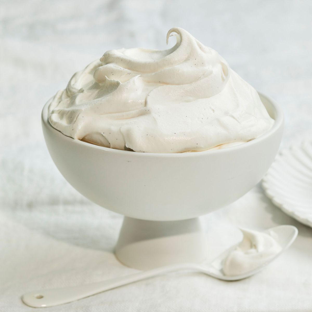 whipped cream in a white bowl