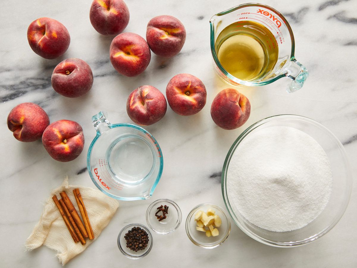 ingredients for pickled peaches including peaches, sugar, and vinegar