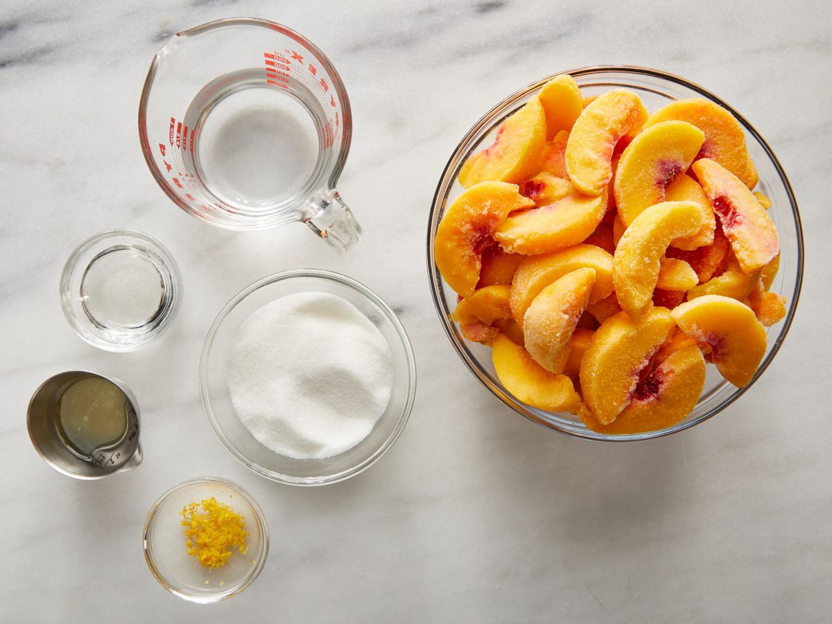 bowls of frozen peaches, sugar, water, corn syrup, and lemon juice