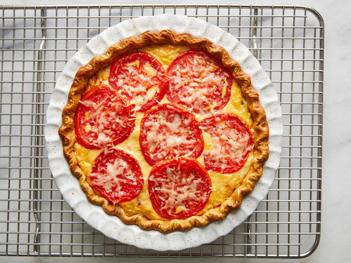 baked tomato corn pie on a cooling rack
