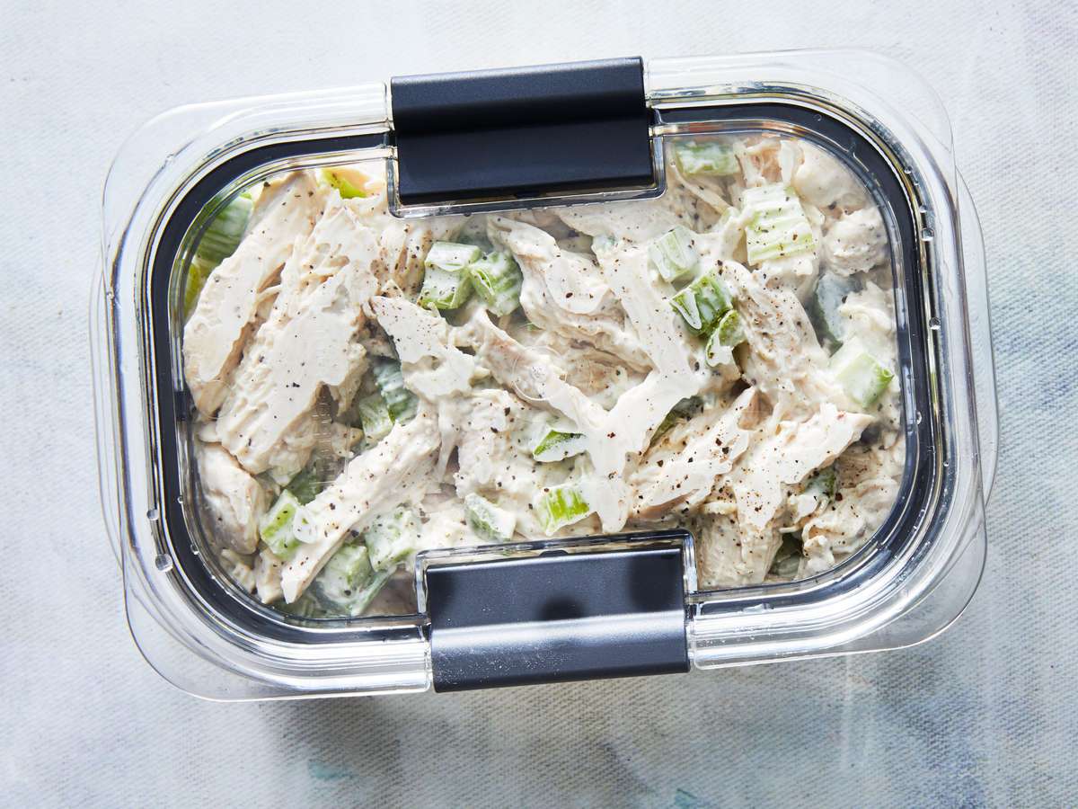 chicken salad in a container with lid on top