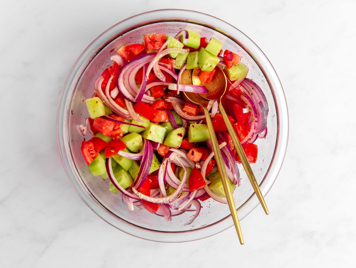 marinating cucumbers, tomatoes, and onions