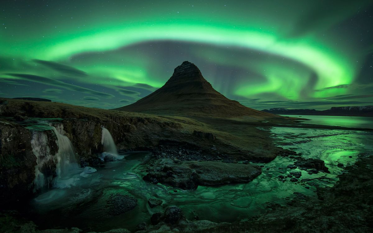 The Northern Lights above Kirkjufell, in Iceland.
