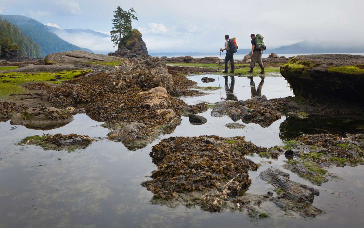 Hikers, Kellet Rock, West Coast Trail, Vancouver Island, British Columbia, Canada