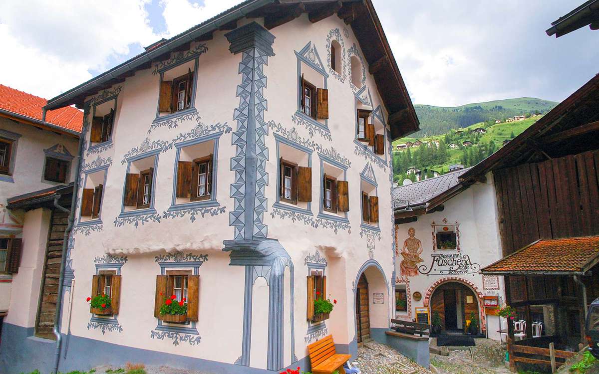 restaurant in old typical building of a village Swiss Alps Bergun.